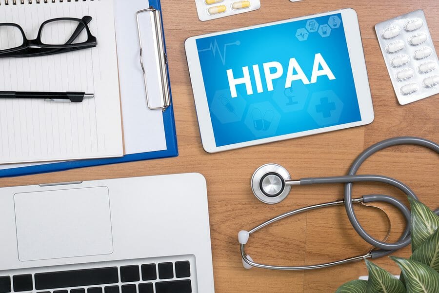 HIPAA Professional doctor use computer and medical equipment all around desktop top view